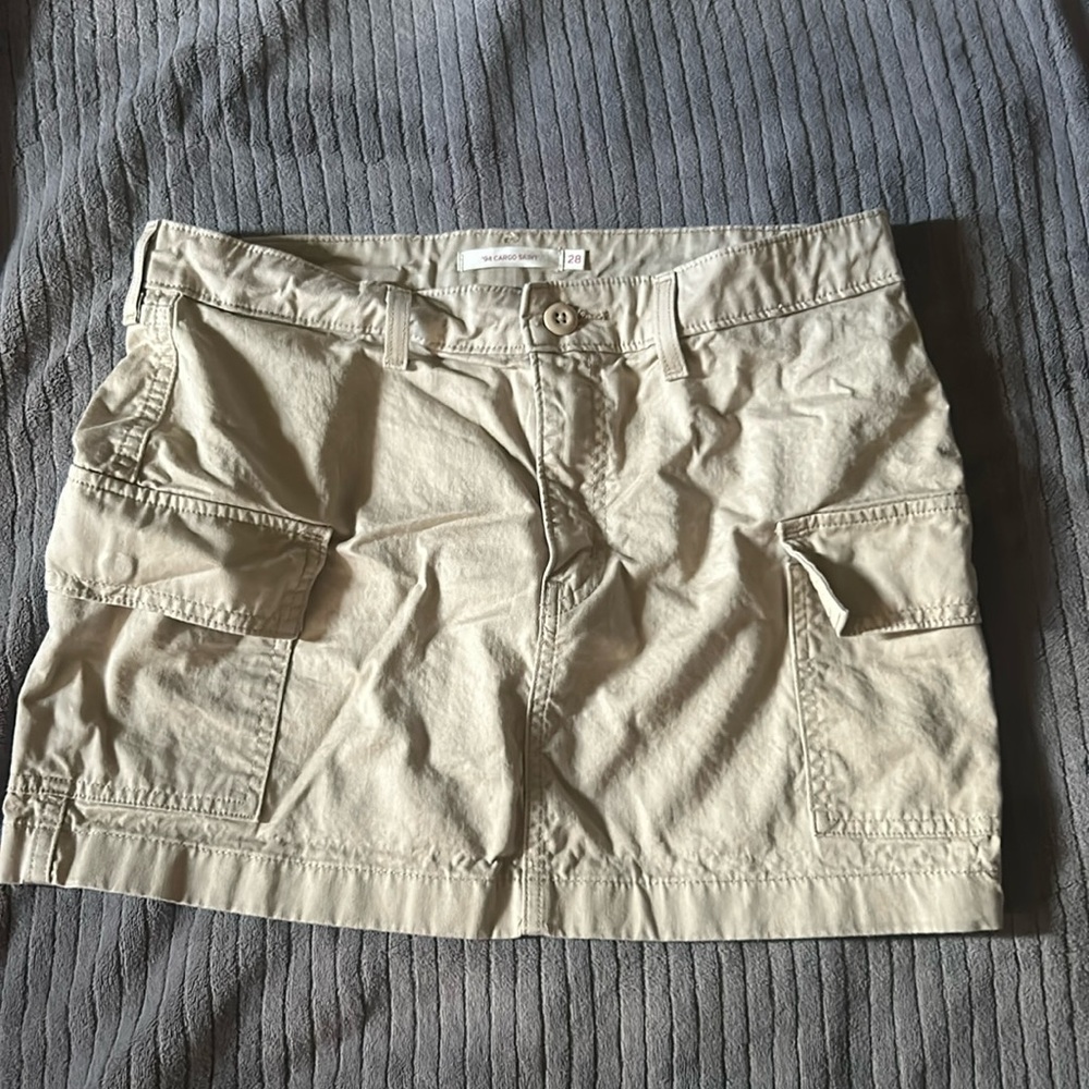 I’m selling a ‘94 cargo skirt that’s a size 28. It’s from Levi’s